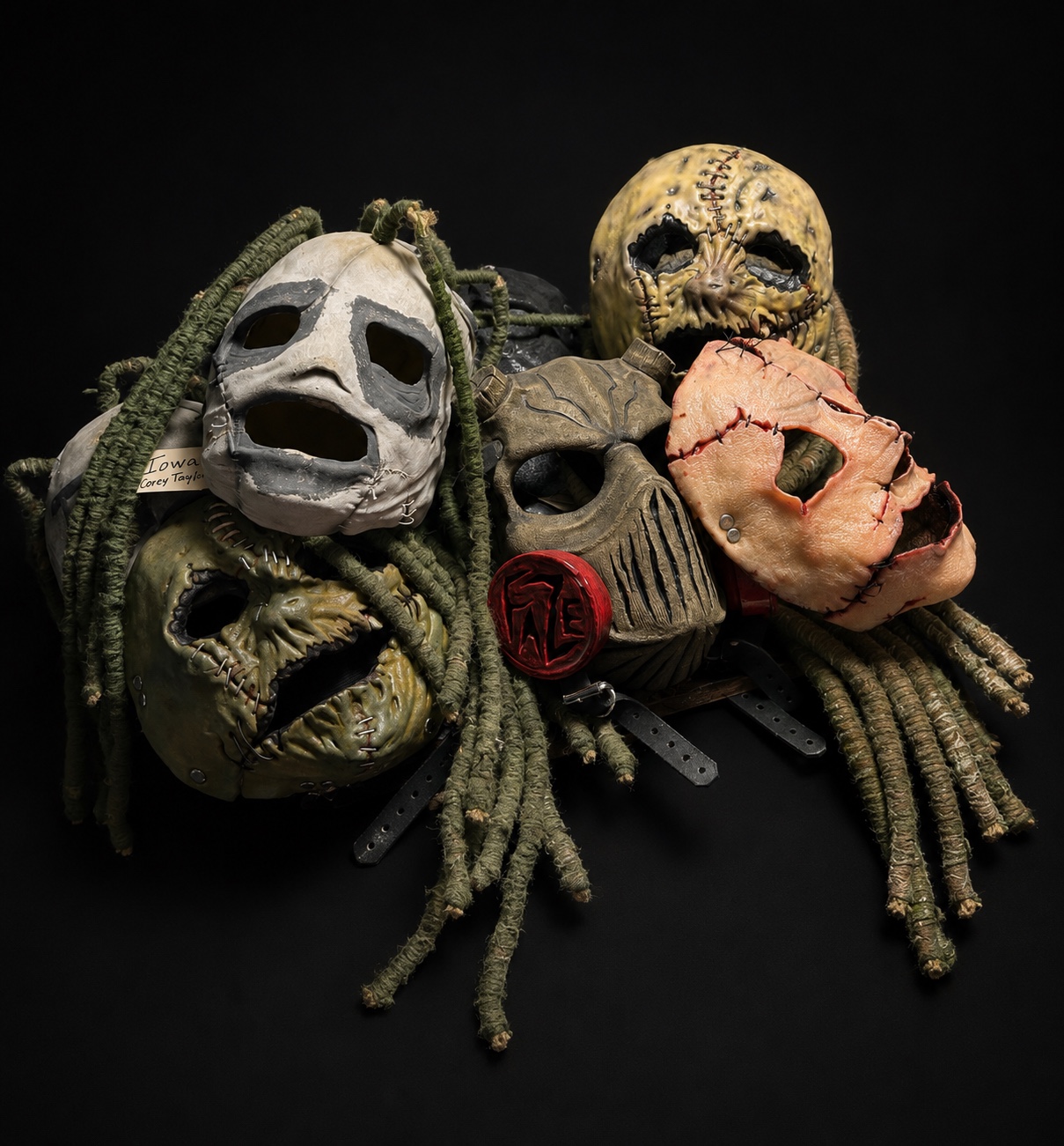 A collection of handcrafted FazeFX horror masks arranged against a black background