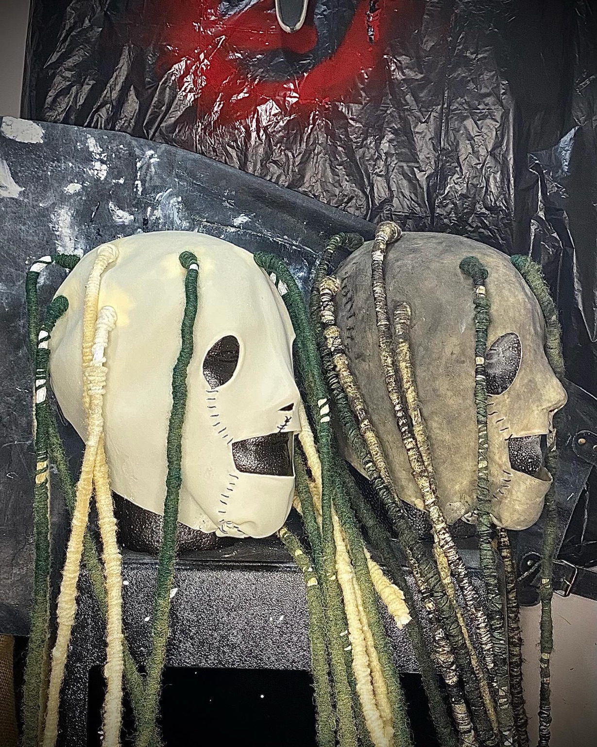 Two finished Self-Titled replica masks at an angle