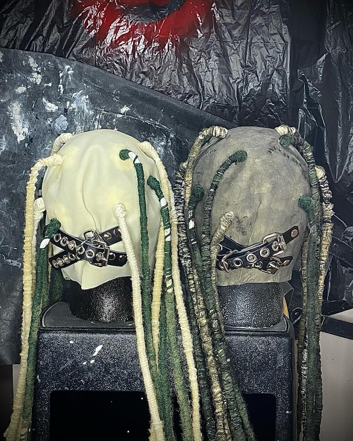 Leather straps and dreadlocks on the finished replica masks
